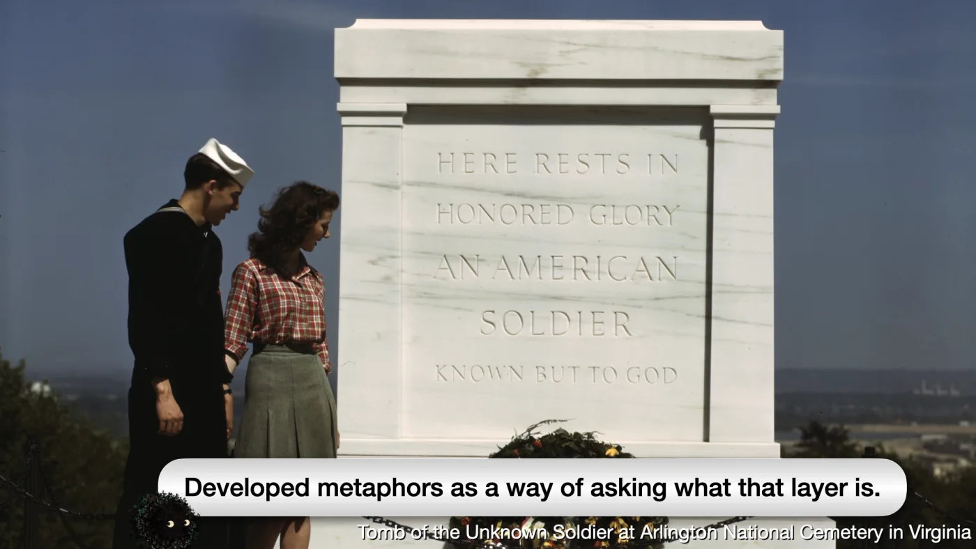 Tomb of the Unknown Soldier at Arlington National Cemetery in Virginia | Sili says: Developed metaphors as a way of asking what that layer is. | picture: a 1943 colour photograph — a sailor and a young woman in a plaid shirt standing at the Tomb of the Unknown Soldier, which reads HERE RESTS IN HONORED GLORY AN AMERICAN SOLDIER KNOWN BUT TO GOD | picture: Sili, small in the distance, in the bottom left, staying put