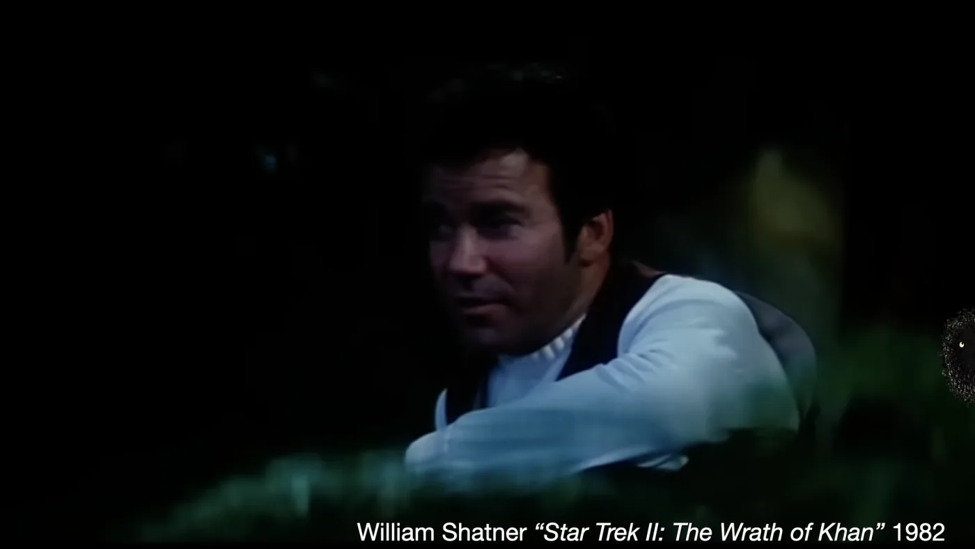 William Shatner “Star Trek II: The Wrath of Khan” 1982 | picture: Shatner's Kirk half-lit in the dark of the Genesis cave, looking off | picture: Sili, over at the right, half off the right edge, rising